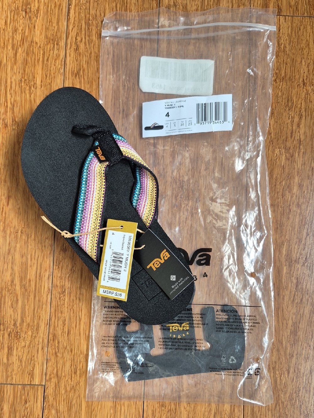 NWT Teva Black Flip Flop with Multicolor Woven Straps